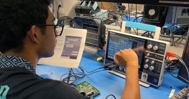 Student at Georgia Tech using the 2 Series MSO to complete a lab assignment