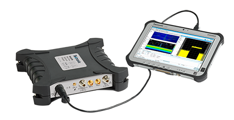 RSA500 Spectrum Analyzer plugged into a tablet PC running SignalVu-PC and displaying a DPX density trigger