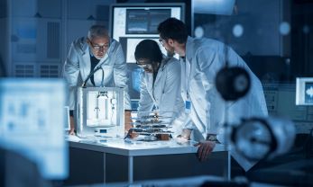 Internal calibration lab technicians discussing options to improve calibration turn around time