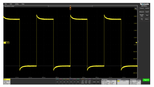 Screenshot from an oscilloscope showing what a waveform looks like with probe overcompensation
