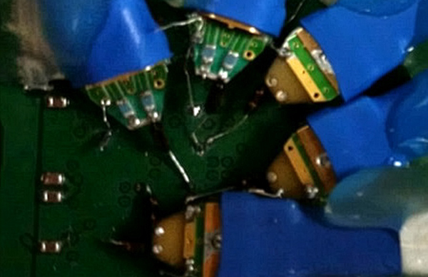 Attaching to vias that are packed closely together requires longer wires.